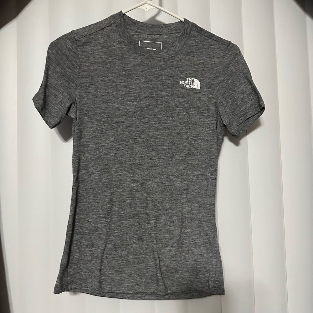 The Northface grey women’s top with slit in back